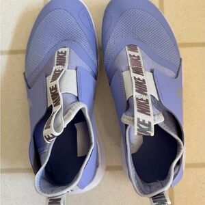 Brand new Nike Slip-On Sneakers in periwinkle size 2y.